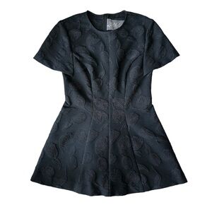 Lela Rose- Black Shortsleeve Tulip Raised Peplum Top